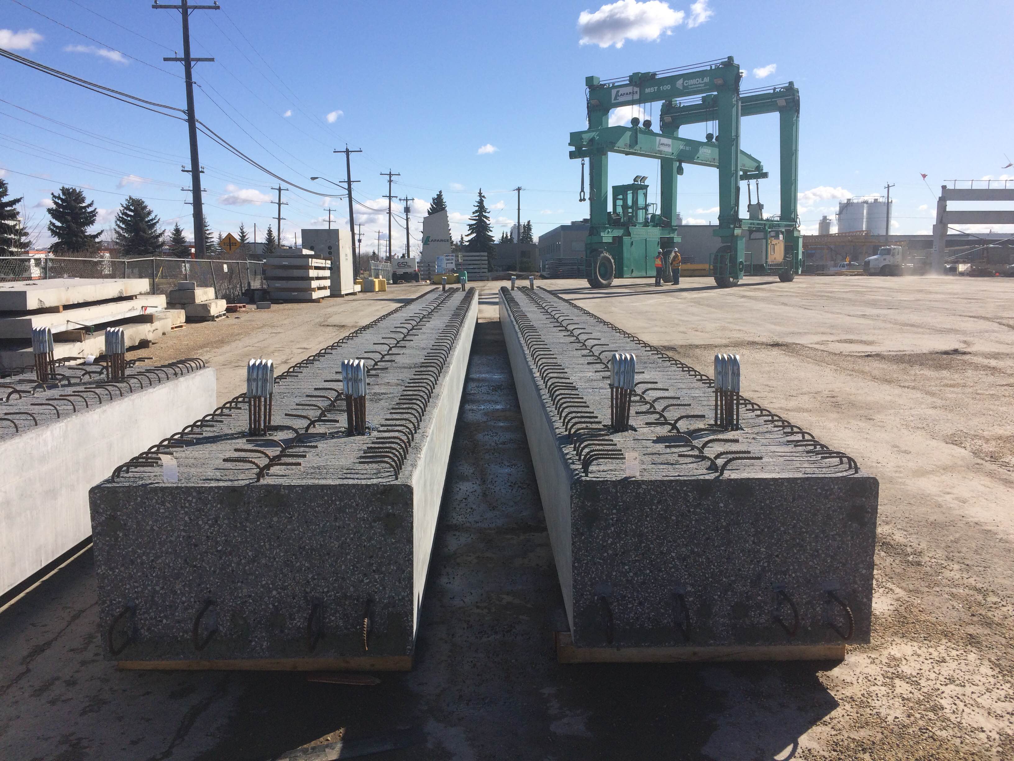 Lafarge Precast Edmonton Concrete Box Girder and Straddle lift in the sun